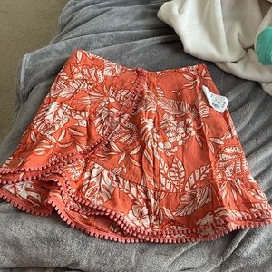 High waisted orange floral print skirt